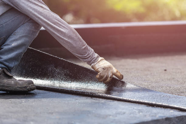 Professional Exterior Waterproofing technician working in Philo, OH